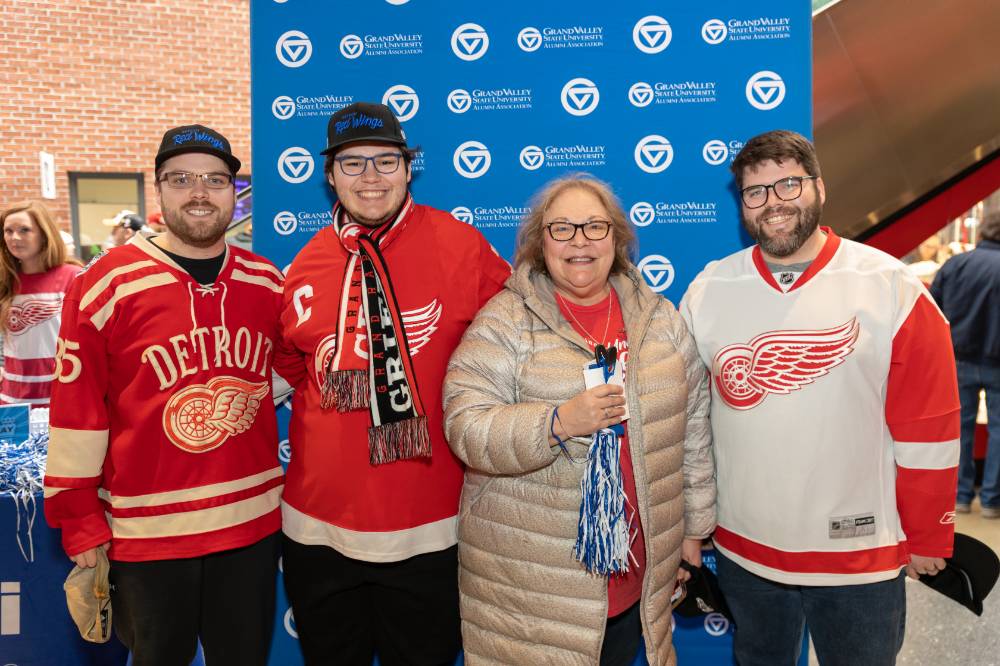 A mother and her sons at the Red Wings game.